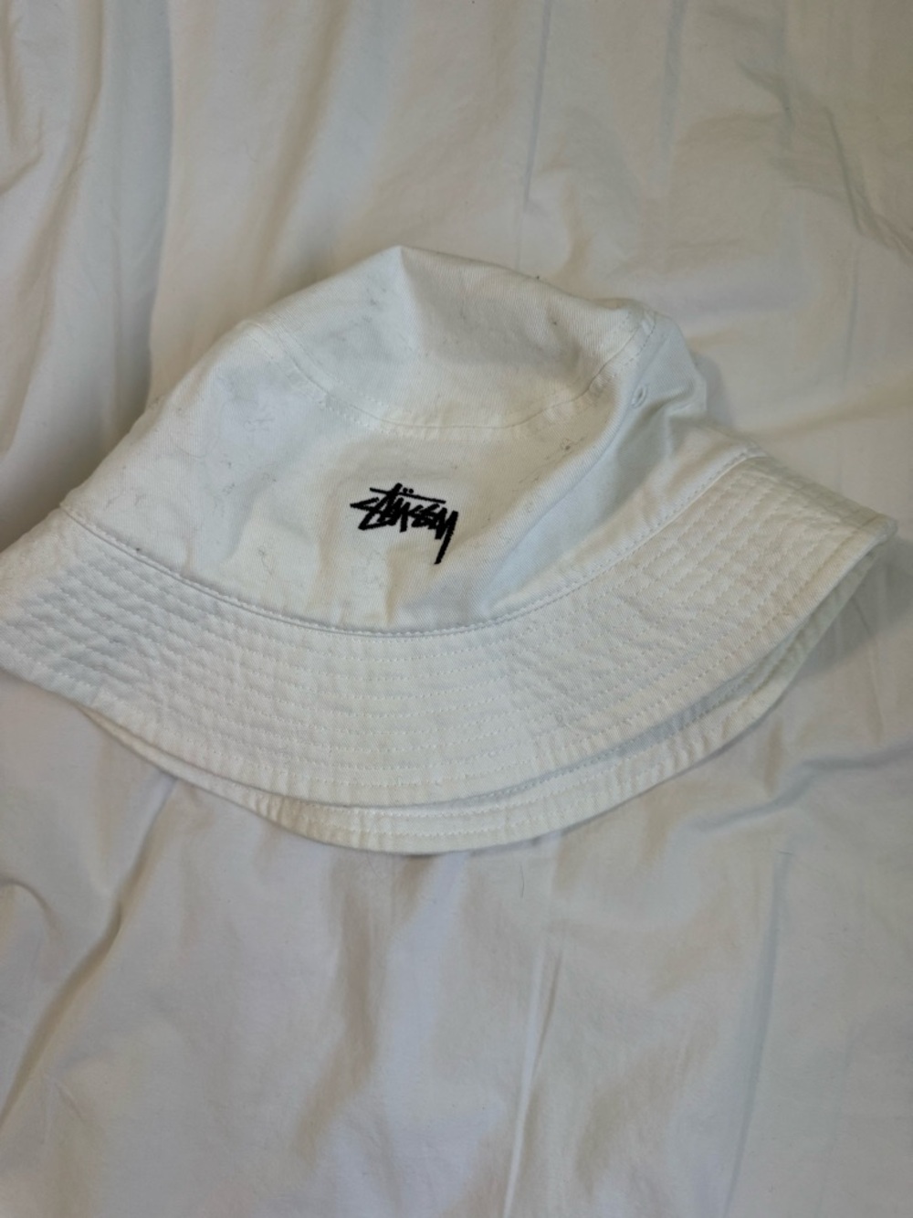 Stussy White Bucket Hat with Black Script Logo